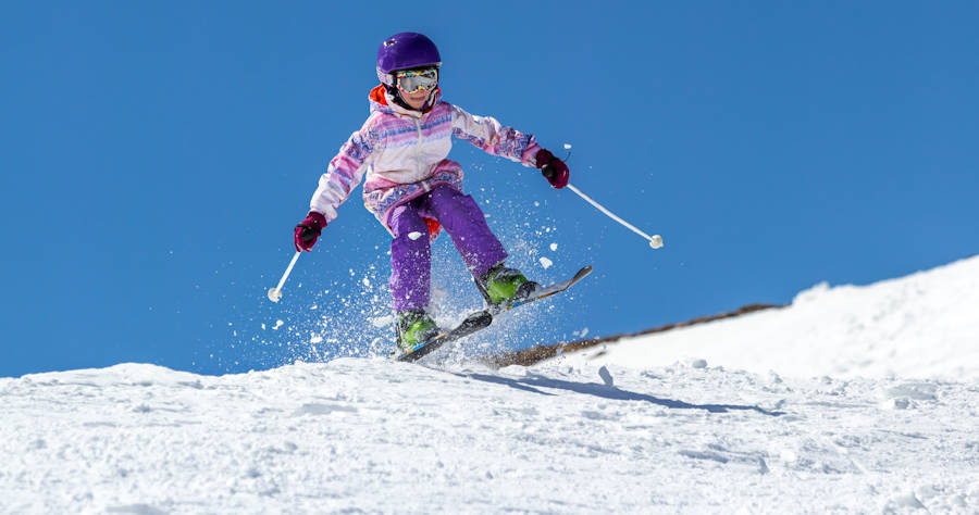 Young school group ski racer near Jindabyne